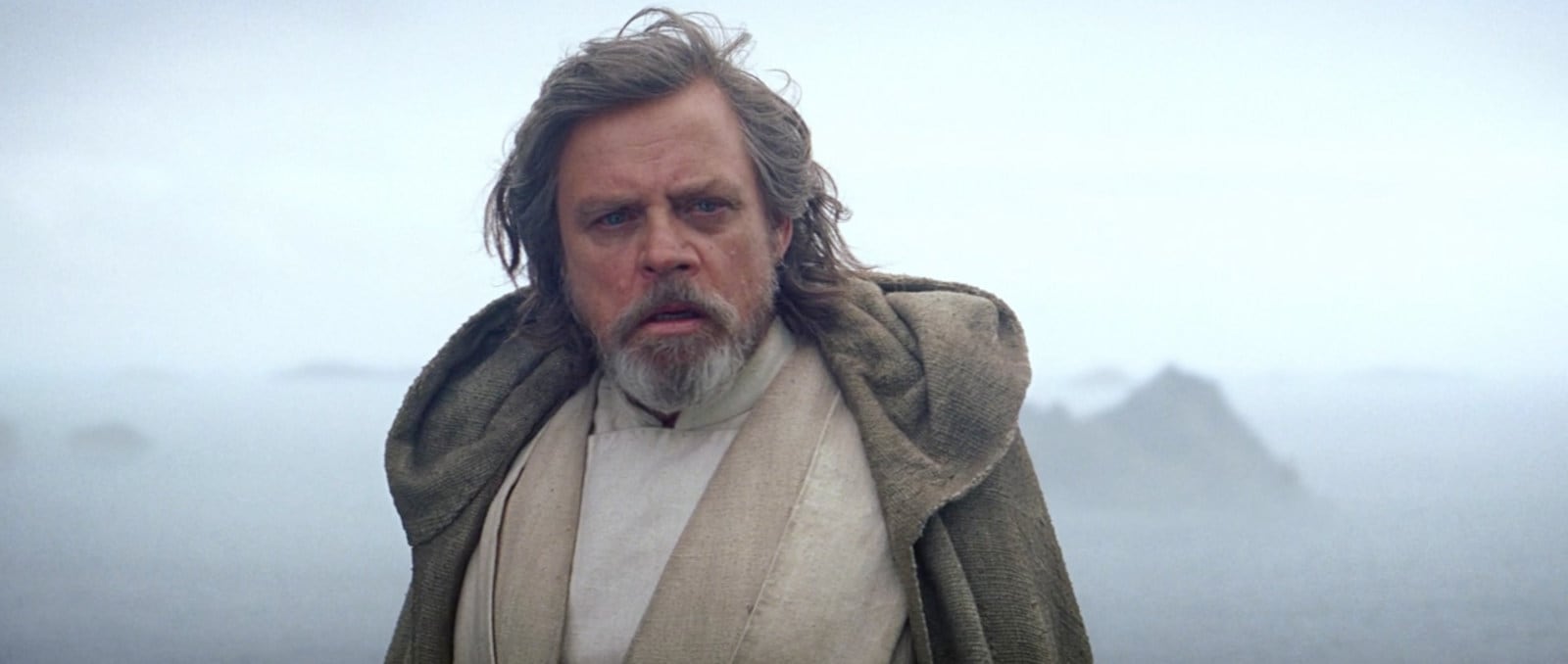 Vidcap of the ending of The Force Awakens, in which Luke looks at Rey for a long time No gap? (From /Film)